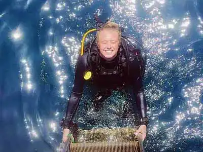 Divemaster Instructor Course candidate exiting the water