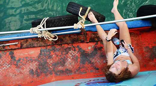 crystaldive.com-suncream-girl-on-boat