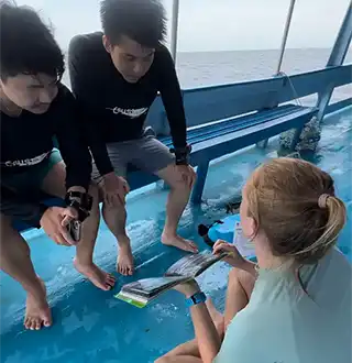 Divemaster Course Trainee briefing divers