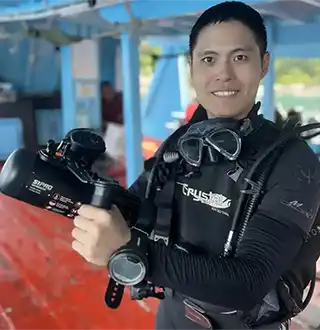 Diver Propulsion Vehicle (DPV) Specialty student on the Crystal Dive boat before a dive