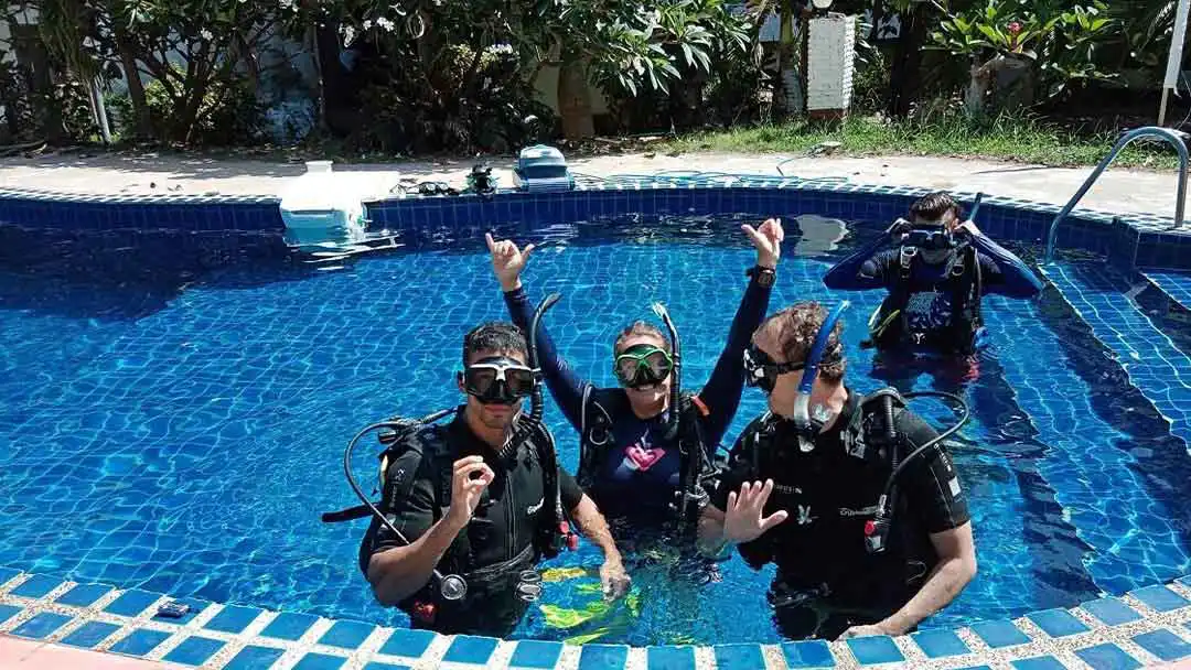 Crystal Dive resort Koh tao students and instructor having fun in the pool