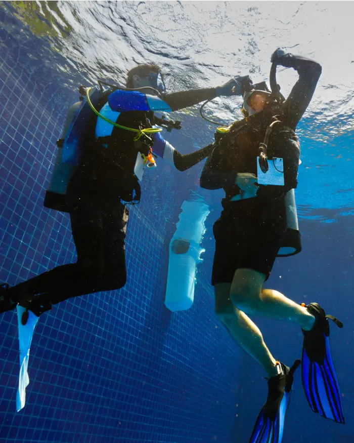 Assistant Instructor Trainer Course (AIT) candidate performing skill in the Crystal Dive pool