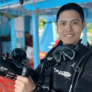 Diver Propulsion Vehicle (DPV) student diver on the Crystal Dive boat on Koh Tao Thailand