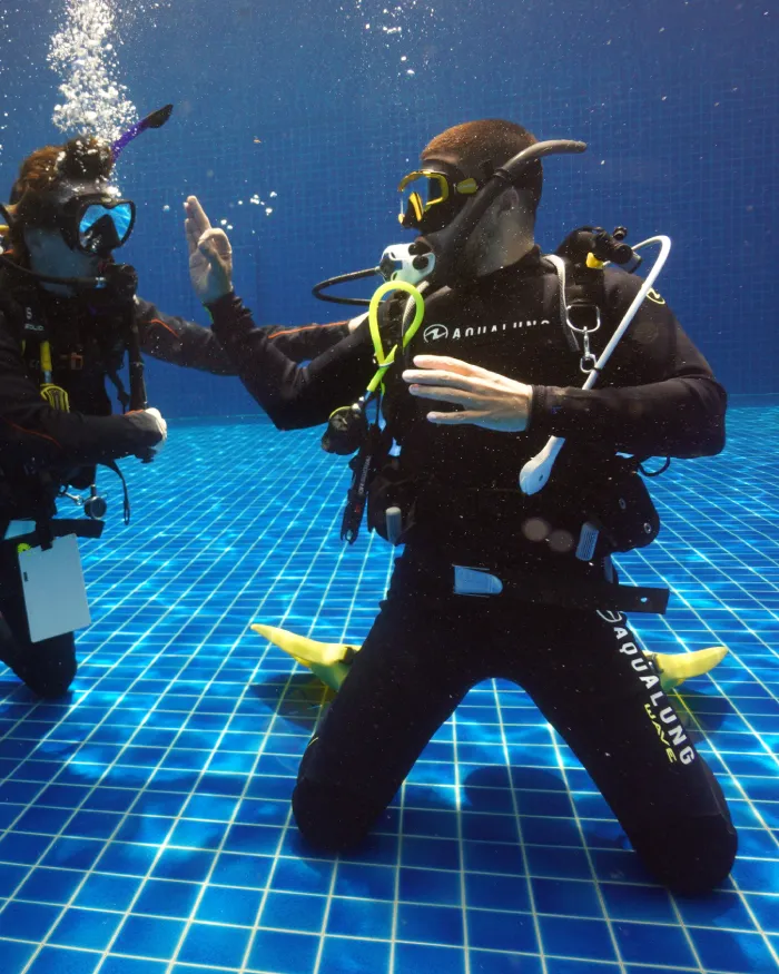assistant instructor trainer course candidate preparing to demonstrate in the Crystal Dive pool