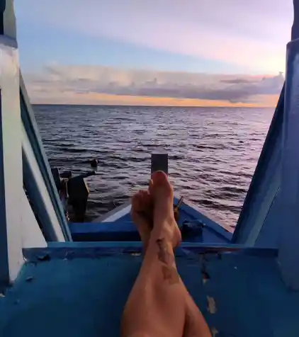 A relaxed diver on the dive boat