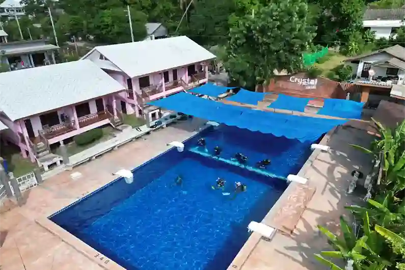 Large pool at Crystal Dive for diving courses seen from above