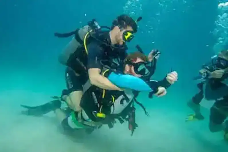 Stress and Rescue Course student seen bringing an unconscious diver to the surface