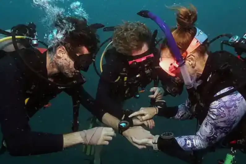 Crystal Dive Search and Recovery Specialty divers practicing lift bag use on Koh Tao
