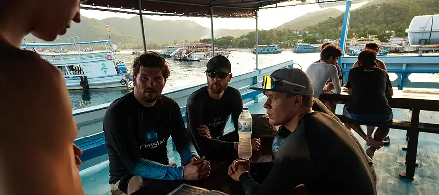 Scuba Divers getting briefed for their dives